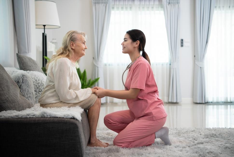 Caregiver in Maryland working with a senior home care client